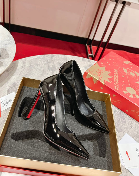 Elegant Pointed-Toe Pumps in Black with Red Sole
