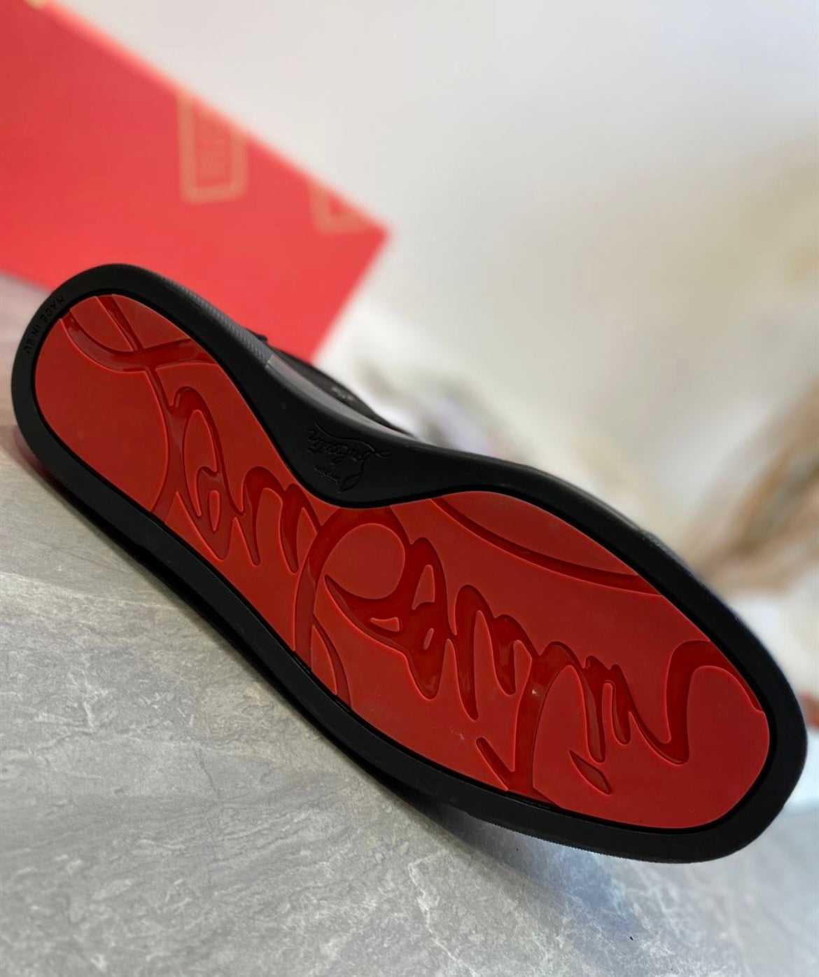 Black Spiked Sneakers with Red Sole