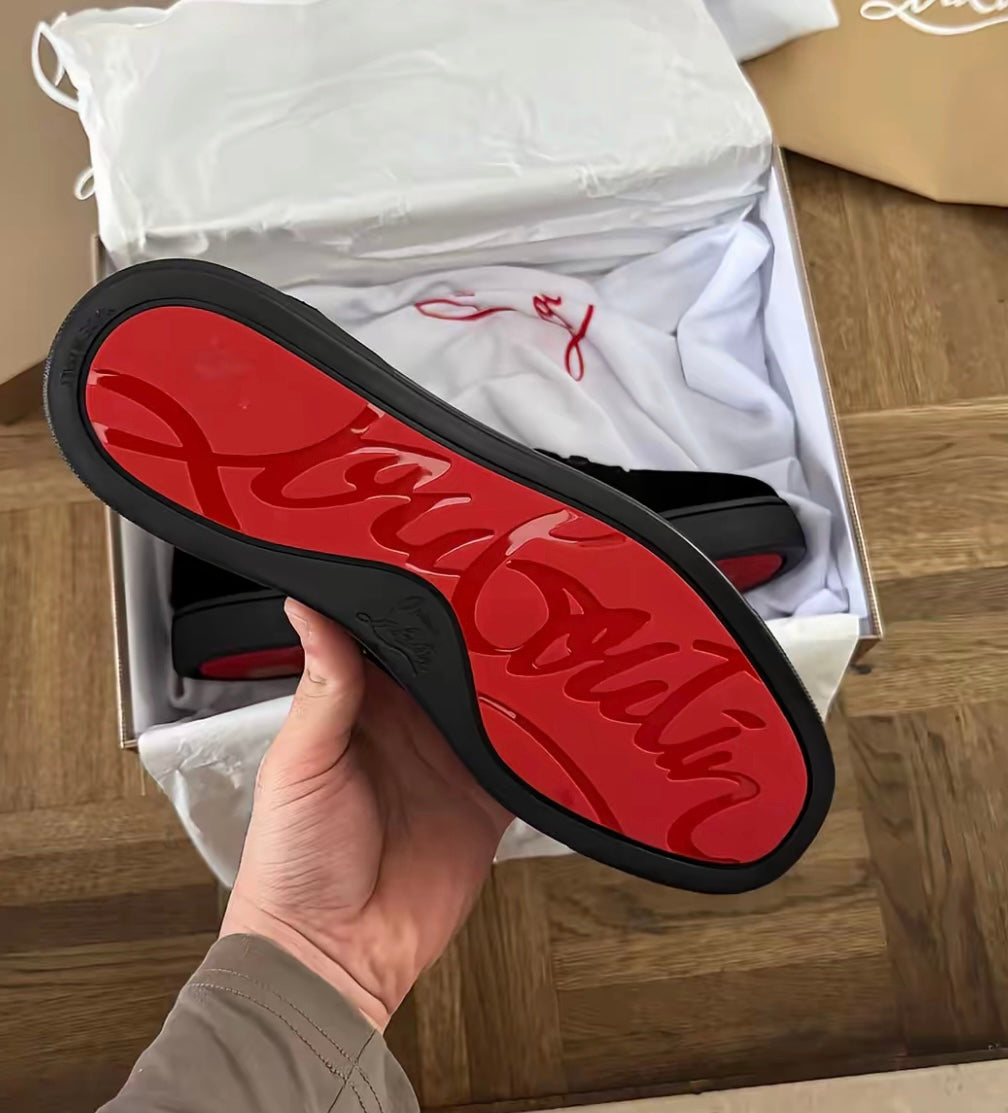 Minimalist Black Sneakers with Red Sole