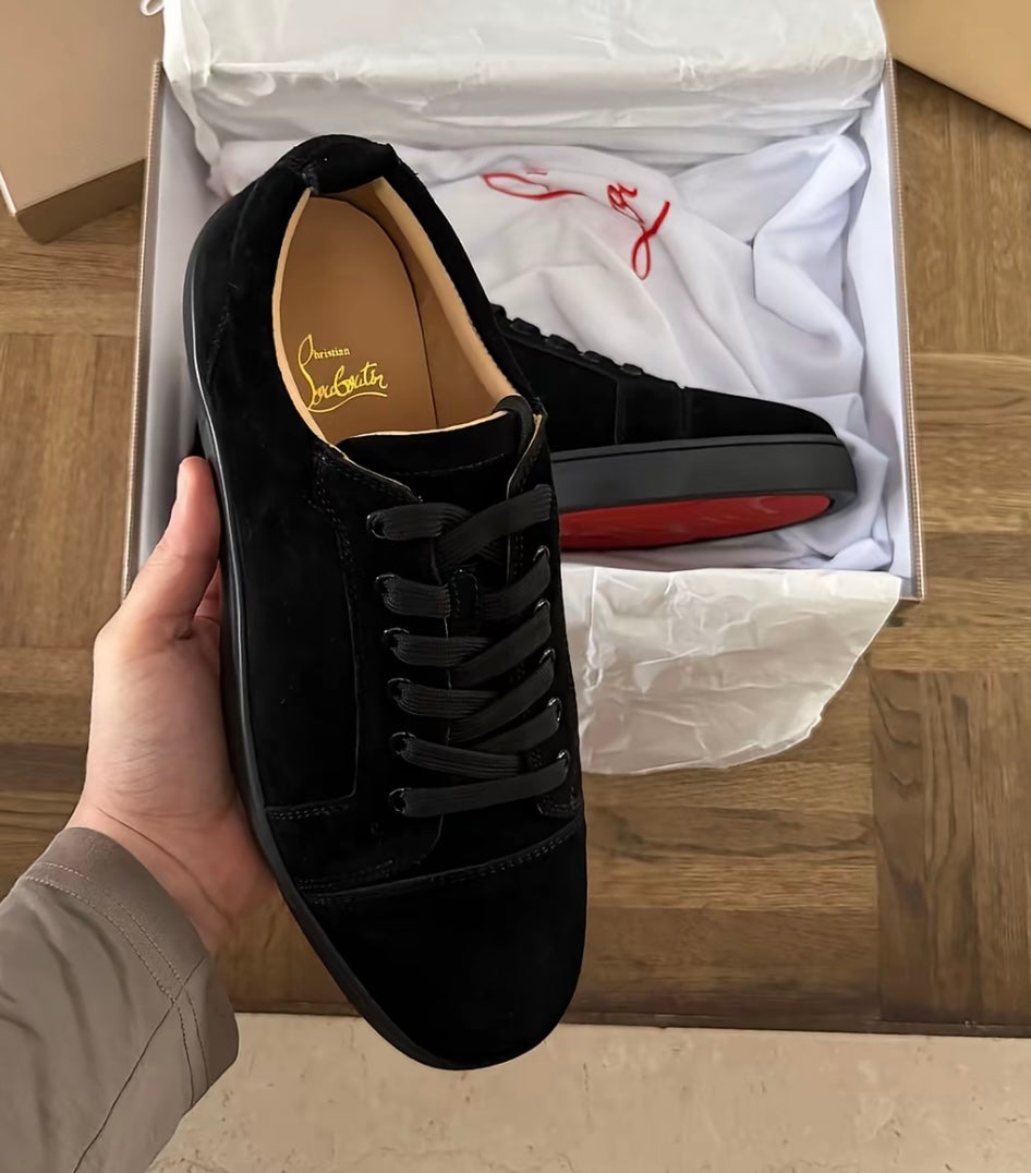 Minimalist Black Sneakers with Red Sole