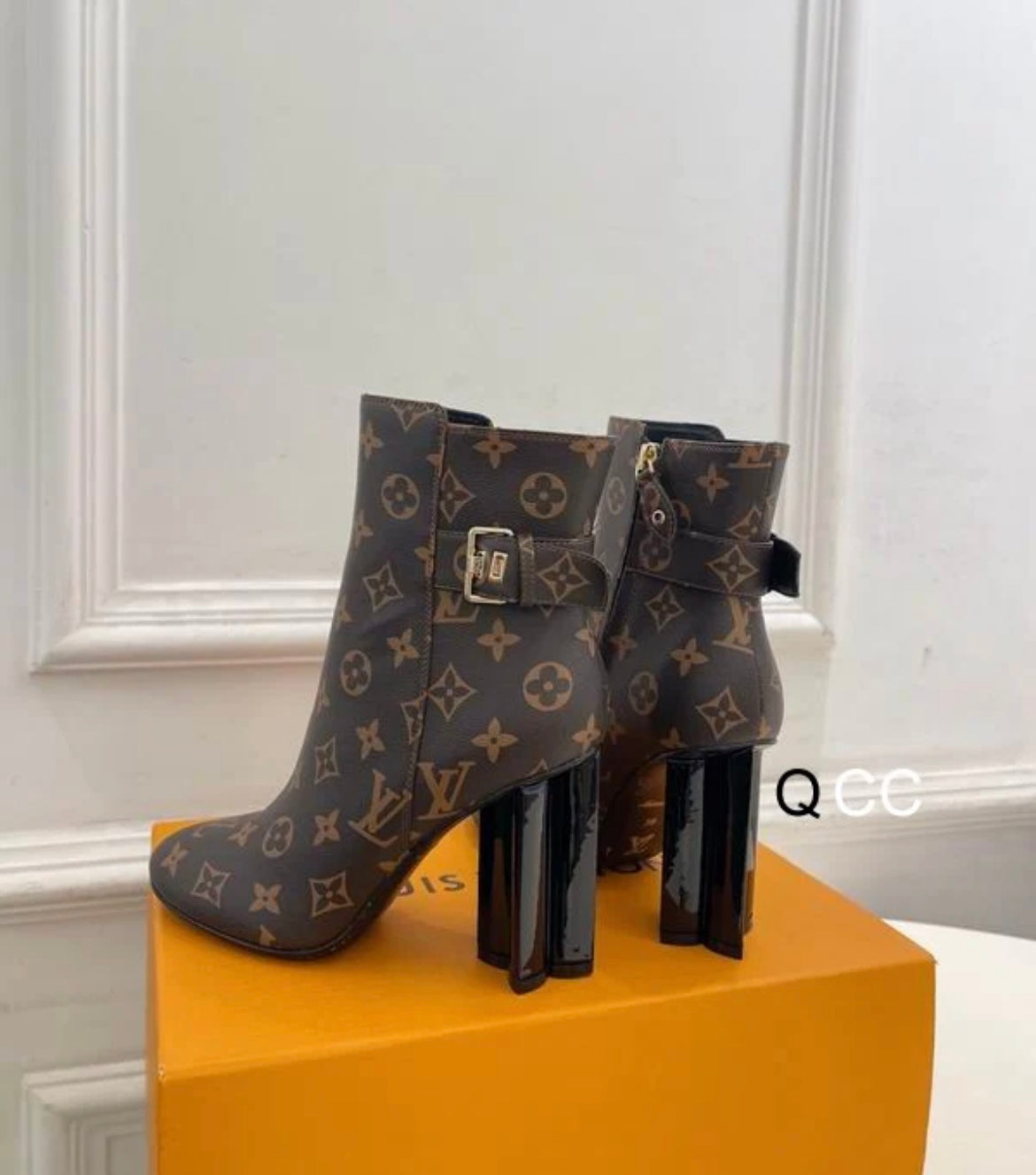 brown boots with printed logo