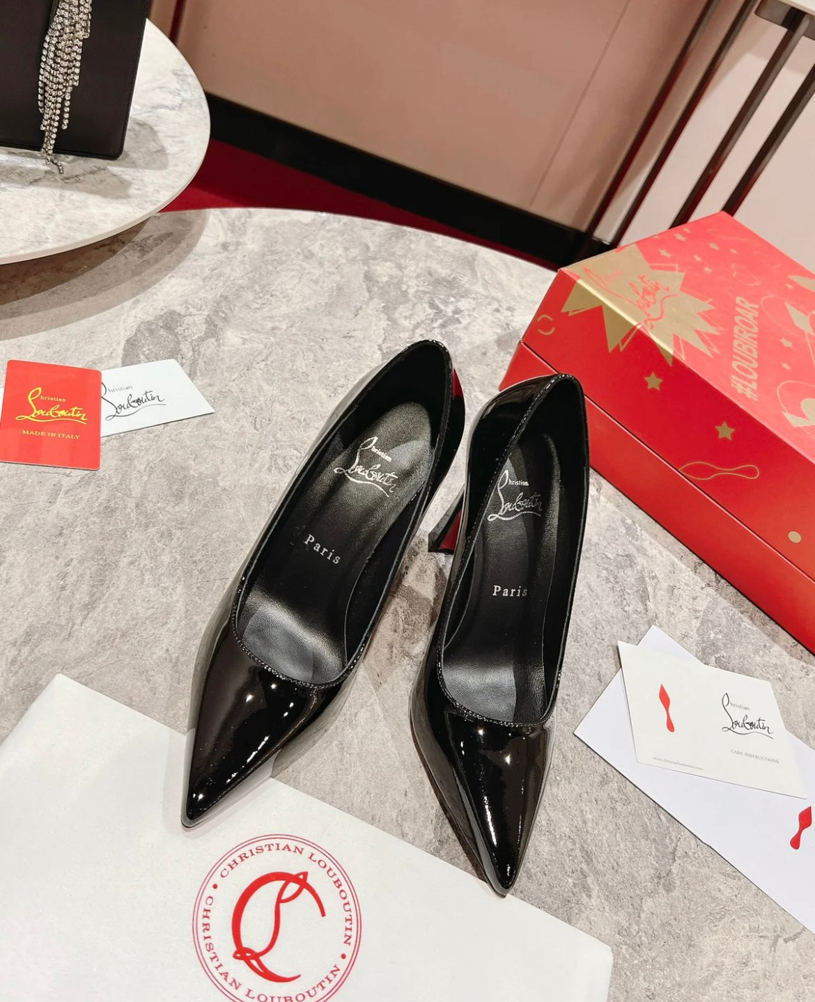 Elegant Pointed-Toe Pumps in Black with Red Sole