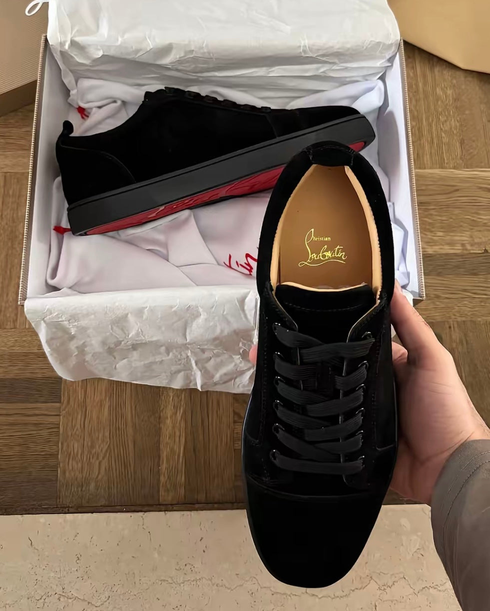 Minimalist Black Sneakers with Red Sole