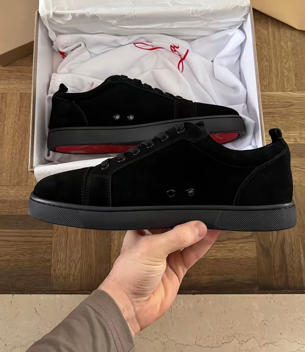 Minimalist Black Sneakers with Red Sole