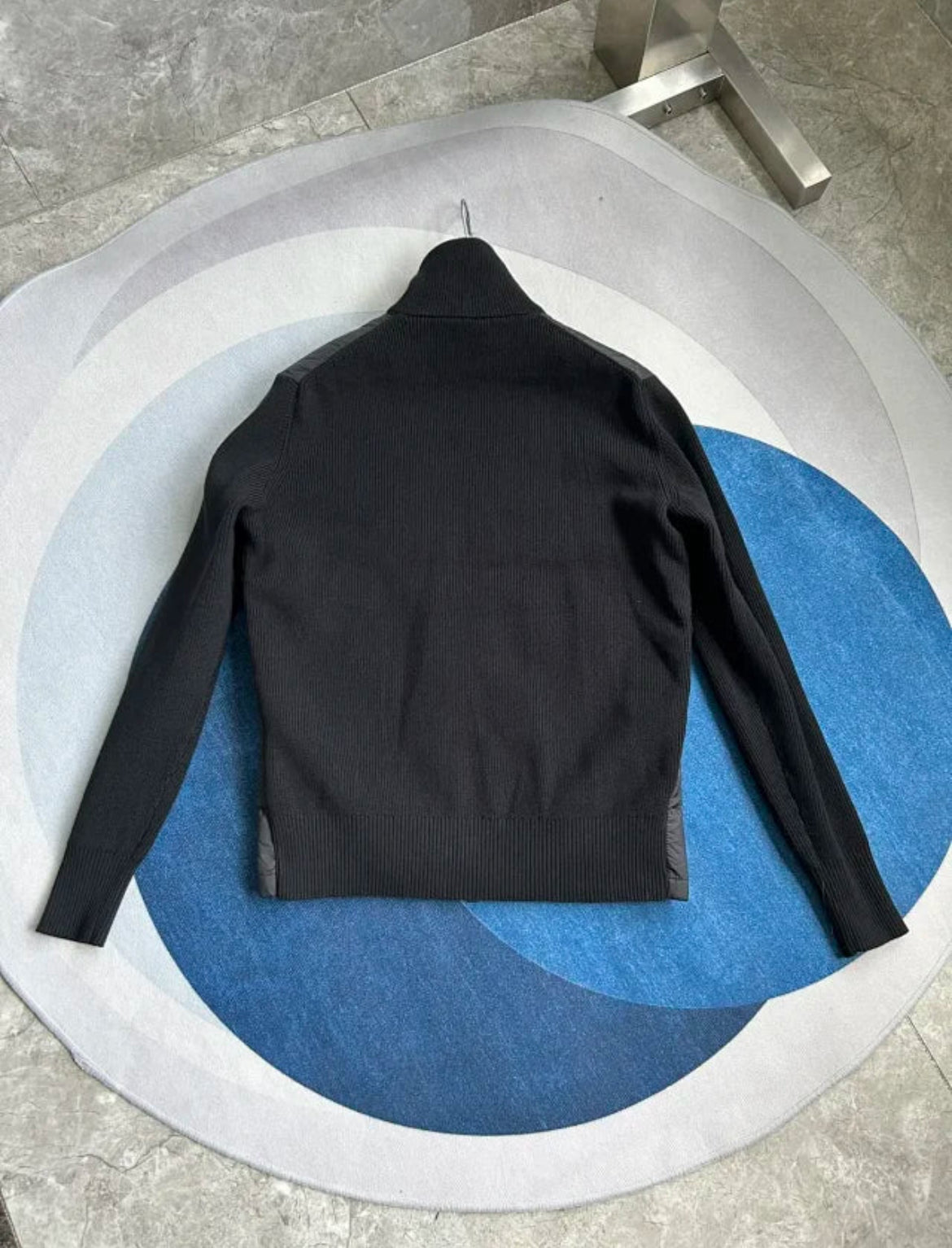 Black cardigan with knit sleeves and logo