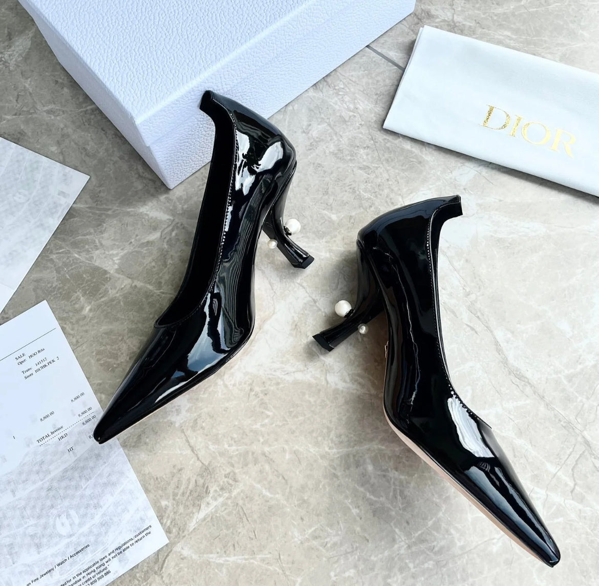 Black pointed heels with pearl