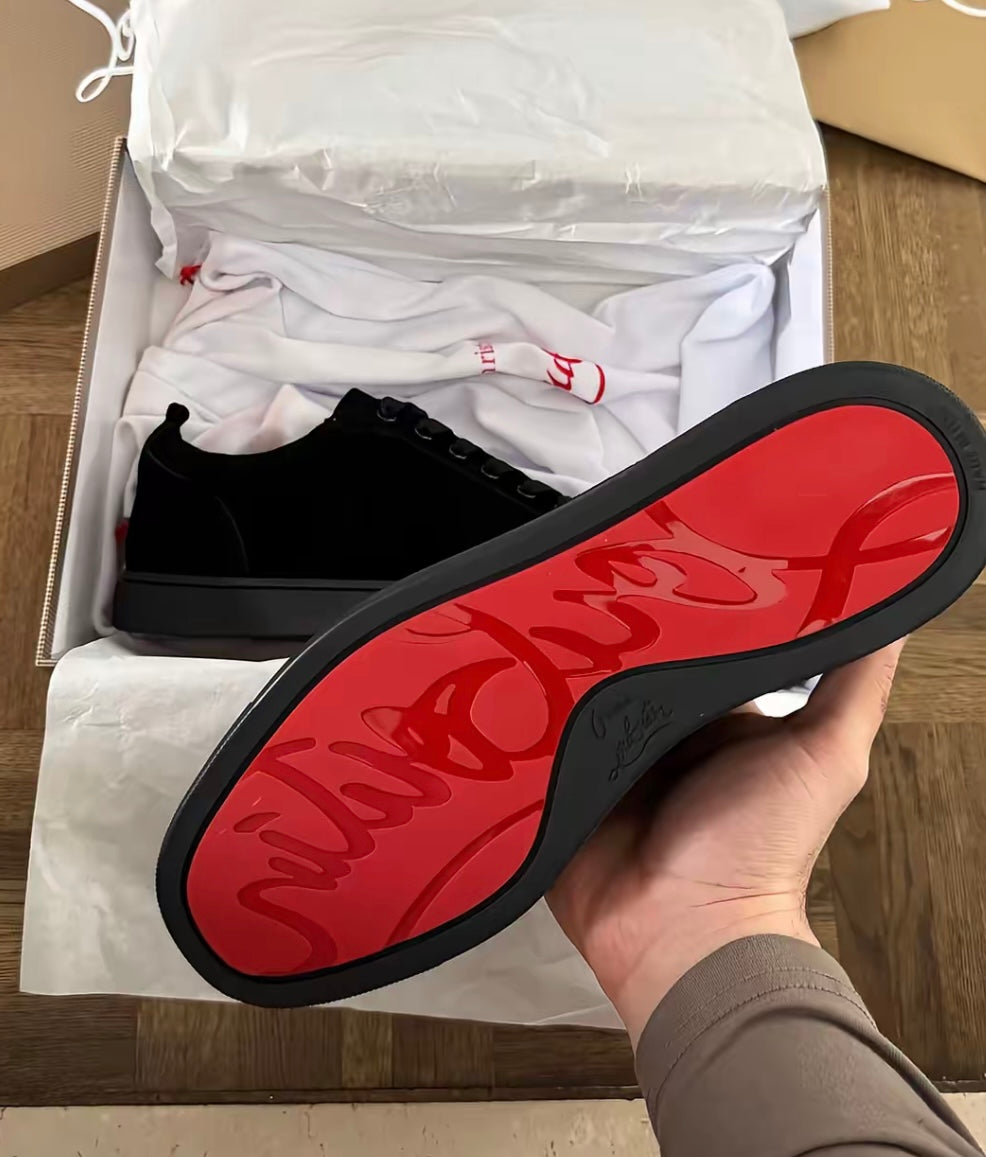 Minimalist Black Sneakers with Red Sole