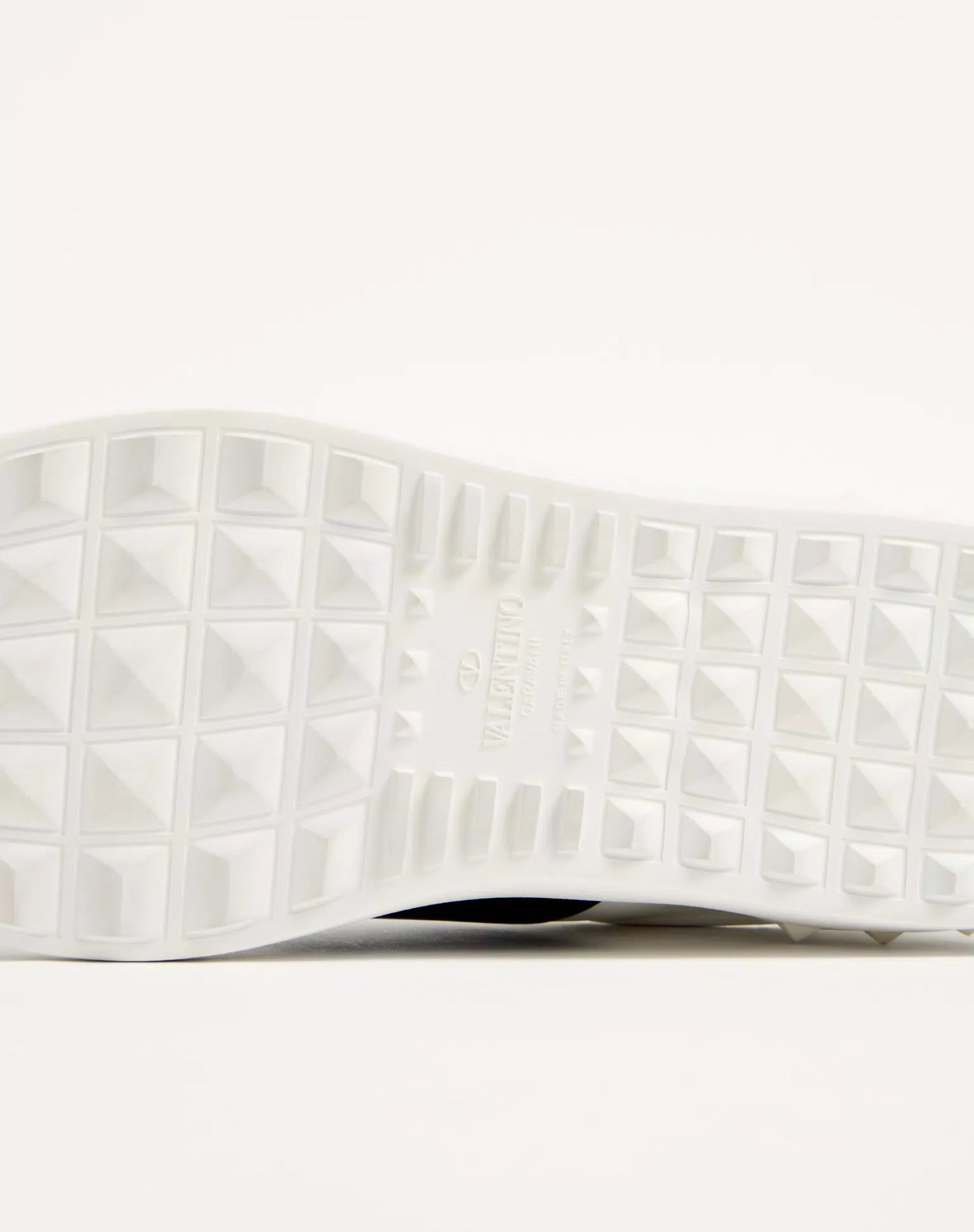 White shoes striped black spiked