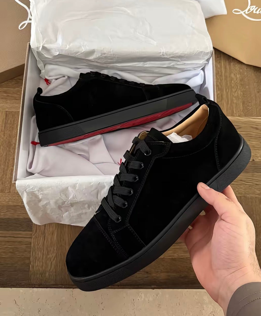 Minimalist Black Sneakers with Red Sole