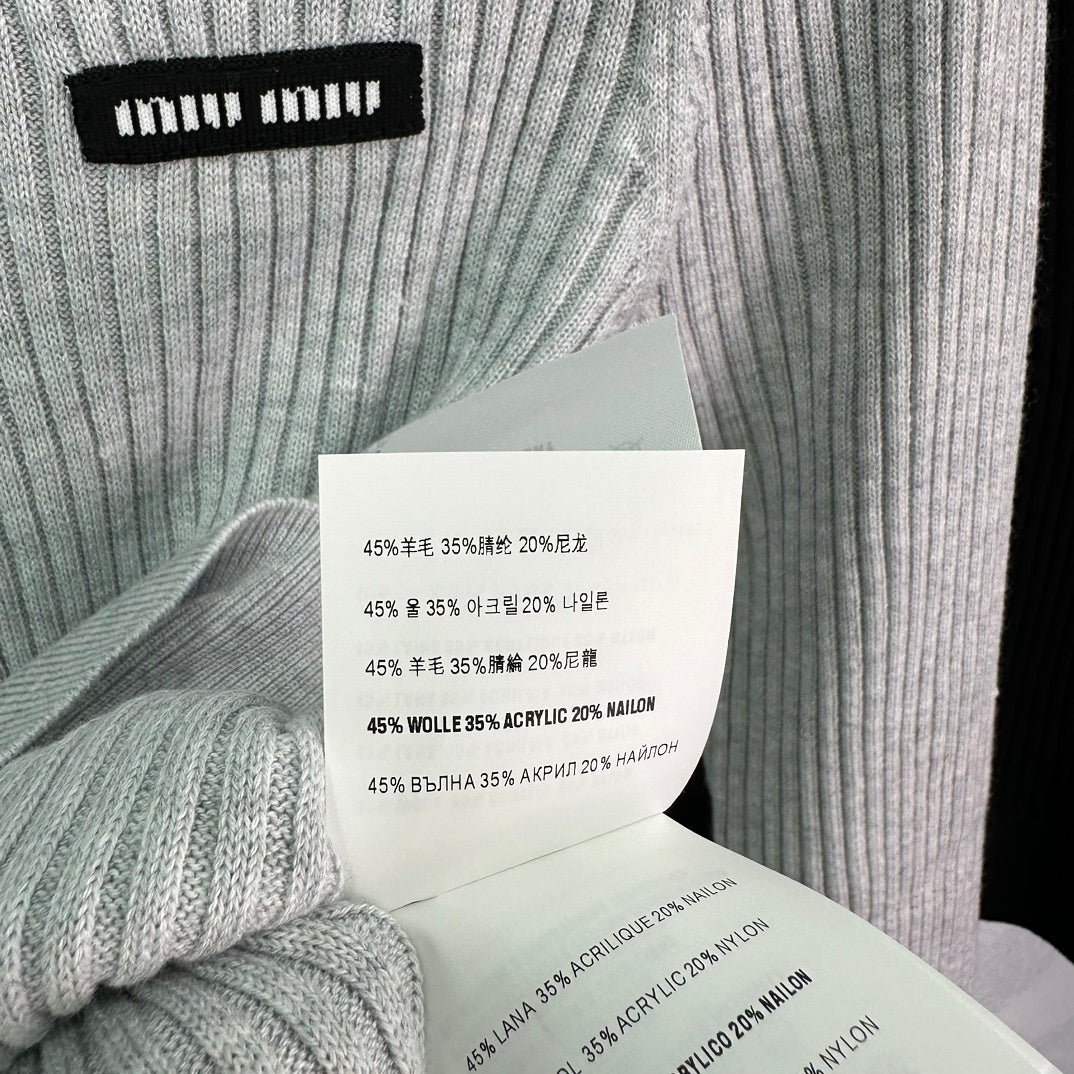 Ribbed High-Neck Wool Sweater